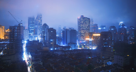 Shanghai, China. Nightlife City Traffic. Development Residential Building. Urban Skyline In Evening...