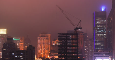 Shanghai, China. Development Residential Building. Shanghai Waitan Residential District. Urban Skyline In Evening Time. Night Illumination. Business District. City Business Center. Smog Over Cityの写真素材