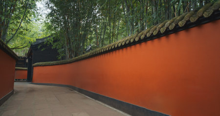 Chengdu, Sichuan, China. Passageway through Wuhou Shrine is flanked on either side by bright red walls. Alley with red walls to mausoleum of Liu Beiの写真素材