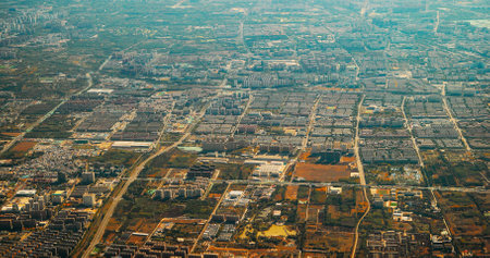 Beijing, China. View From Airplane Window On Multi-story Buildings Of Changhe Garden District In Beijing. Aerial View On Suburb. High-rise Houses Elevated View Cityscape Skyline. Urban Residential Area Overlooks To City. Real Estateの写真素材