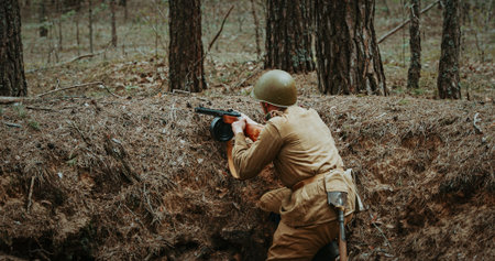 Soldier Aiming in a Forest During Historical Warfare Scene. Soviet Russian Soldier Aiming With Rifles. Soldiers Shoots With Rifle. Soviet Russian Soldier Uniformの写真素材