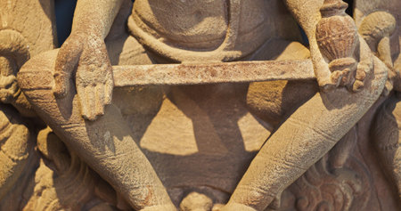 Close-up view on Ancient Stone Bas-relief Of Brahmani Or Brahmi, One Of Seven Hindu Mother Goddesses Known As Sapta Matrikas. She Is Aspect Of Adi Shakti, Possessing rajas Guna And Is Therefore Source Of Brahmas Powerの写真素材