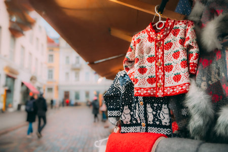 Various Colorful Knitted Traditional European Warm Clothes - Sweaters At Winter Christmas Market. Christmas Winter Souvenir From Europeの写真素材