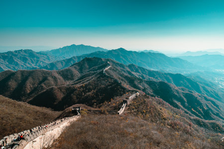 Majestic View of Great Wall Amidst Breathtaking Mountainsの写真素材