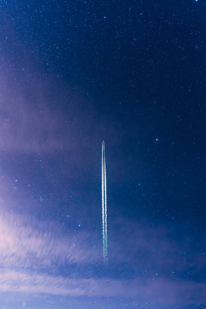 Contrail In Blue Sky. Aircraft Plane In Clear Sky Backgroundの写真素材