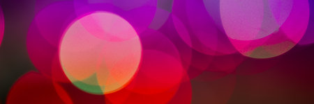 Abstract Blurred Bokeh Boke Background Of Dot Lights Through Branches In Evening Park. Red And Yellow Colorの写真素材