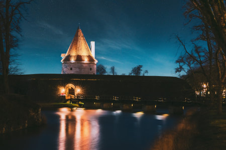 Kuressaare, Saaremaa Island, Estonia. Episcopal Castle In Evening Blue Hour Night. Traditional Medieval Architecture, Famous Attraction Landmark. Old Towerの写真素材