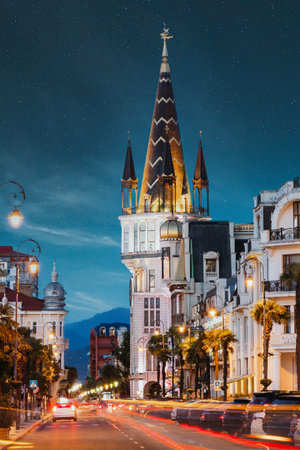 Batumi, Adjara, Georgia. Evening View On Former National Bank Building With Astronomical Clock On Europe Squareの写真素材