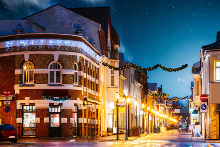 Parnu, Estonia. Night View Of Famous Ruutli Street With Old Buildings, Restaurants, Cafe, Hotels And Shops In Festive Evening Night Christmas Xmas New Year Illuminationsの写真素材