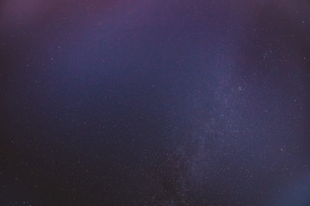 Night View Of Natural Glowing Stars Of Milky Way. Night Starry Sky Background.