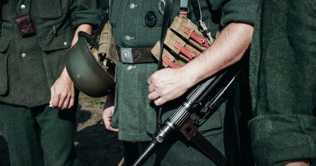 Re-enactor Dressed As German Wehrmacht Infantry Soldier In World War Ii With Submachine Gun Mp 40. German Soldier Uniform. German Soldiers Outfitの写真素材