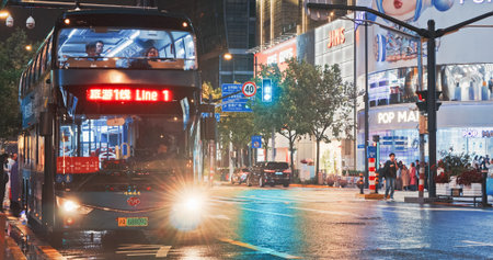 Shanghai, China. Touristic Double-decker Bus Parked At Street. Pop Mart Advertise On Large Poster On Background. Pop Mart Selling Collectible Toys And Figurines In Blind Box Format. Bright Advertising Posters On Buildingsのeditorial素材