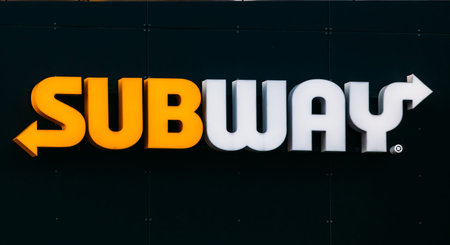 Logo Sign Brand of Subway On Wall Of Fast Food Restaurantのeditorial素材