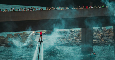 Flyboard Water Show Performance with Spectators at Luxury Waterfront Venue