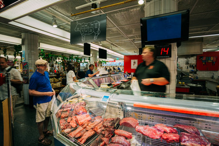 Trade in the local Hay Market Hotorget in Stockholm, Sweden. Butcher counter with fresh meat at Hotorget market hall, Stockholm, Sweden