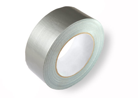 TPL tape consists of special glass fiber reinforced polyethylene basis with rubber adhesive coating. Waterproof reinforced adhesive tpl tape (duct), gray color with a metallic sheen, isolated image on white background.の写真素材