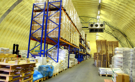 ST-PETERSBURG, RUSSIA - JUNE 13   storage hangar with shelves and goods, June 13, 2013  Warehouse...