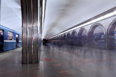 St. Petersburg; Russia - March 7; 2014: Platform underground station Metro Academic, subway train crowded with passengers blue, space is filled with people who rush hour.のeditorial素材