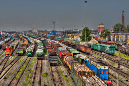 St. Petersburg, Russia - May 22, 2015: Railway station marshalling yard Moscow, classification yard, rail tracks colour,  proviso departure, freight train ready for departure.のeditorial素材