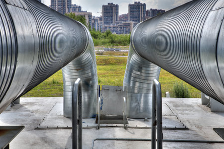 St. Petersburg, Russia - July 9, 2015: Outdoor the main pipeline of hot water and heating of...