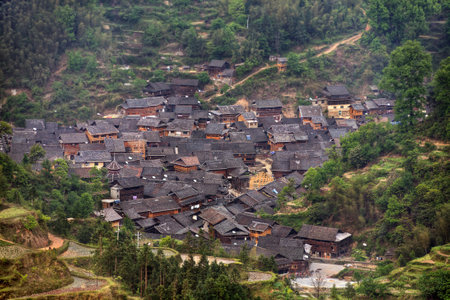 Small hamlet of ethnic minority Dong, near the village of Zhaoxing, top view, daylight, cloudy, spring, Jilun Dong Village, Guizhou Province, China.のeditorial素材