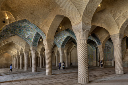 Fars Province, Shiraz, Iran - 19 april, 2017: Monolithic pillars support arched vaults in prayer...