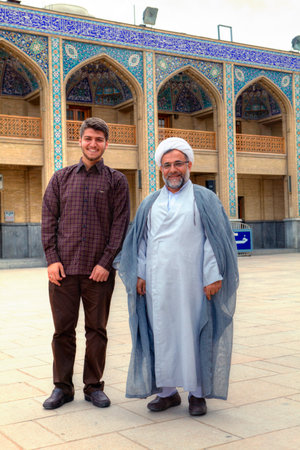 Fars Province, Shiraz, Iran - 19 april, 2017: Shah Cheragh Shrine, Islamic clergymen posing for a photographer in the courtyard of the mosque.のeditorial素材