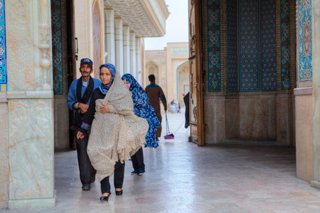 Fars Province, Shiraz, Iran - 19 april, 2017: Shah Cheragh Shrine, Muslim parishioners pass through the large gate of mosque, Iran.のeditorial素材