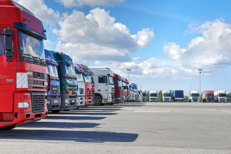 St. Petersburg, Russia - July 27, 2017: A fleet of trucks with a trailer, parking in the territory of a logistics terminal.のeditorial素材