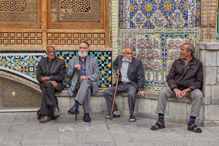 Tehran, Iran - April 27, 2017:Iranian elderly pilgrims are sitting near the Shrine of Hazrat Abdulazim al-Hasani.のeditorial素材
