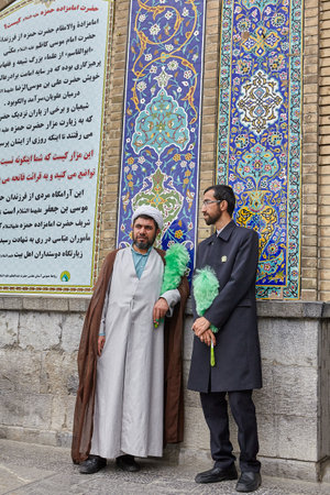 Tehran, Iran - April 27, 2017: Iranian mullah in turban and man stand near The Shah Abdol Azim Shrine.のeditorial素材