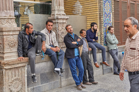 Tehran, Iran - April 27, 2017: Iranian men sit near a column in the Shrine of Hazrat Abdulazim al-Hasani.のeditorial素材