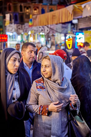 Tehran, Iran - April 27, 2017: Iranian woman in hijab stands in the Oriental bazaar near Shahr-e-Rey metro station.and smiles.のeditorial素材