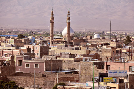 Kashan, Iran - April 26, 2017: City landscape of a residential area of the city with a mosque and...
