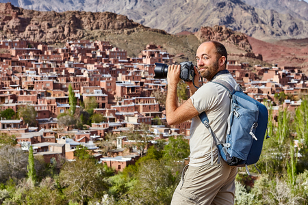 Solo Journey through Iran, an independent tourist photographs the village of Abyaneh during a self-guided tour.の写真素材