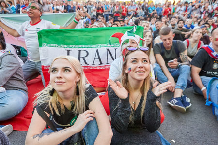 St. Petersburg, Russia - June 25, 2018: FIFA World Cup, fans are watching football match between teams of Iran and Portugal.のeditorial素材