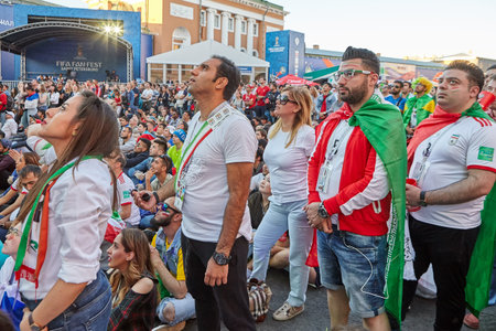 St. Petersburg, Russia - June 25, 2018: FIFA World Cup Iranian fans watch football match on giant screen in St Petersburg.のeditorial素材