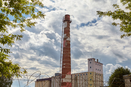 Vitebsk, Belarus - July 7, 2018: Old brick chimney on baking industry.のeditorial素材