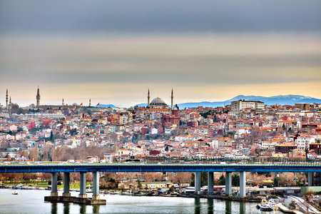 Istanbul, Turkey - February 12, 2020: Top view on the Halic Bridge across Golden Horn bay and Fatih district with Ayvansaray and Balat neighborhoods.のeditorial素材