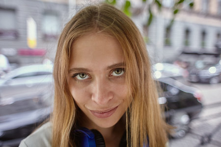 Young blonde white woman outdoor. Portrait of caucasian attractive female about 20 years old with...