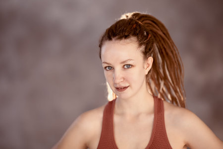 Box braids in white young woman hairstyle.