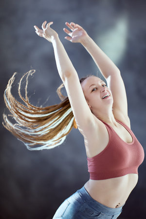 Synthetic box braids for hair extensions in hairstyle of European woman 28 years old.