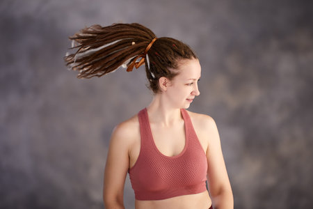 Hair extensions with box braids, artificial hair in hairstyle of young European woman.の写真素材