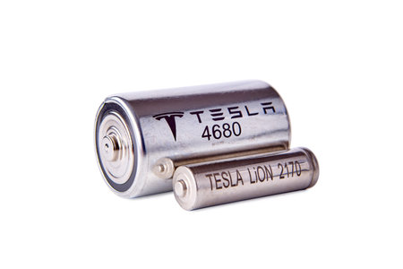 New Tesla 4680 battery compared to old 2470, St. Petersburg, Russia, January 6, 2022.のeditorial素材