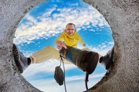 Septic system cleaning, using sewage pump to pumping wastewater to sewage drain before maintenance.の写真素材