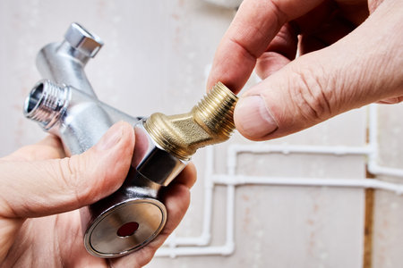 To bathtub shower faucet attaches threaded brass eccentric dog leg type reducer.の写真素材