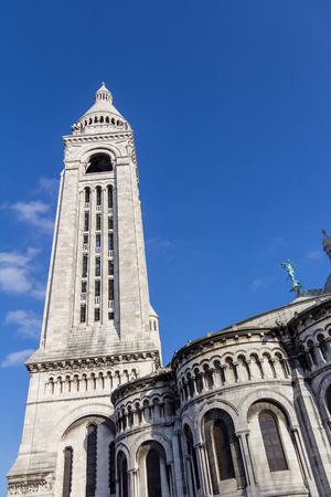 Sacre-Couer on a sunny day under blue skies photographed from a non-traditional angleの写真素材