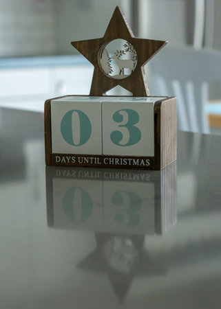 Christmas decoration with a star counting down the days until Christmas