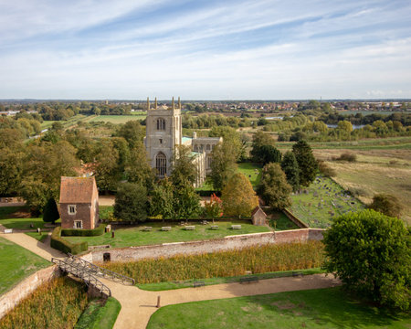 Exterior view of Holy Trinitiy Collegiate Church and surrounding area in Tattershall, Lincolnshire, England, United Kingdomのeditorial素材