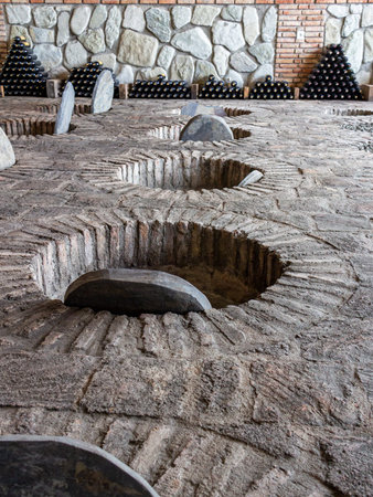 July 6, 2019 - Sekhnika Winery, Kakheti, Georgia - Traditional method of producing Georgian wine in...